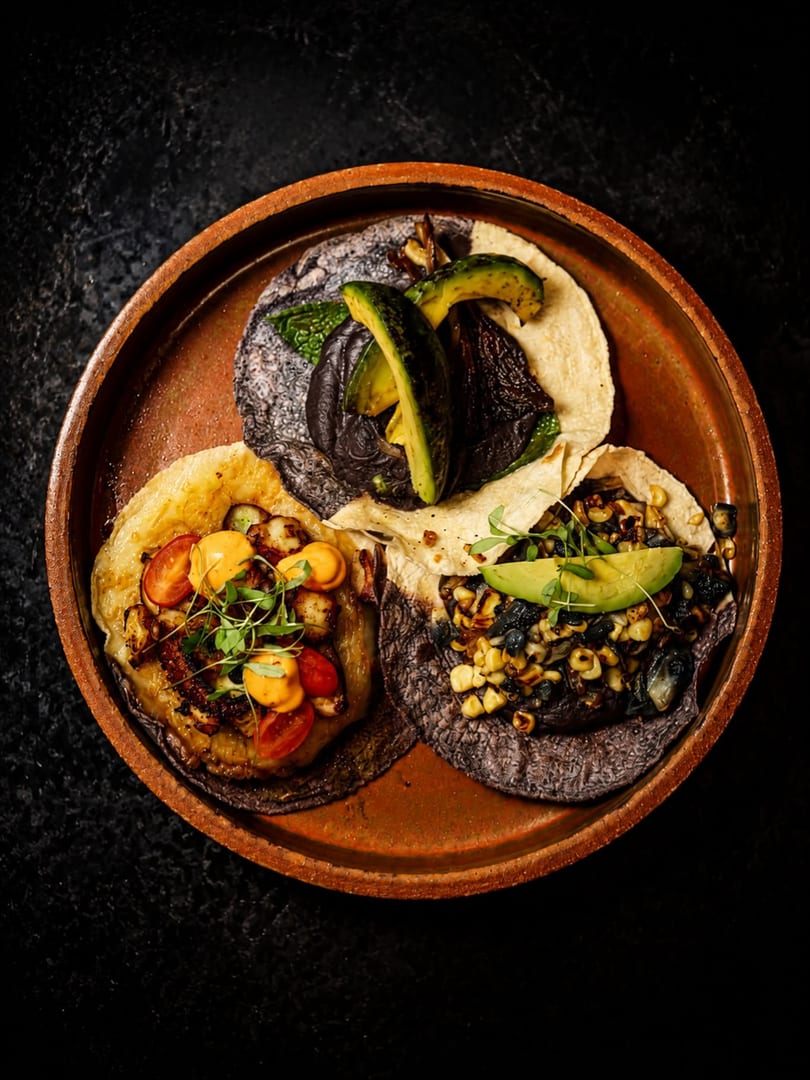 Trio of vegetable tacos on handmade tortillas